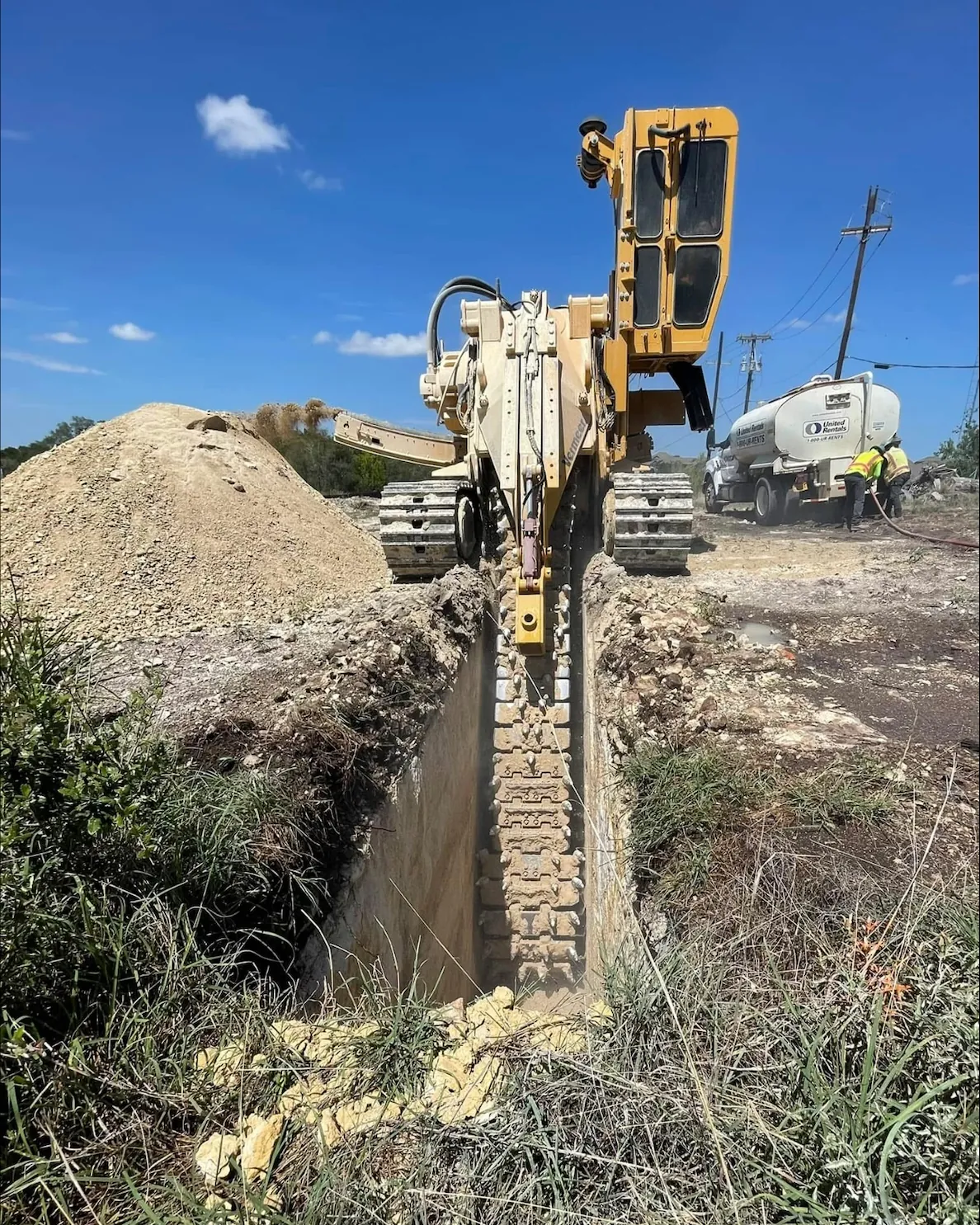 Narrow underground cable trench cut through rock by a Ridge Rock Excavation trencher