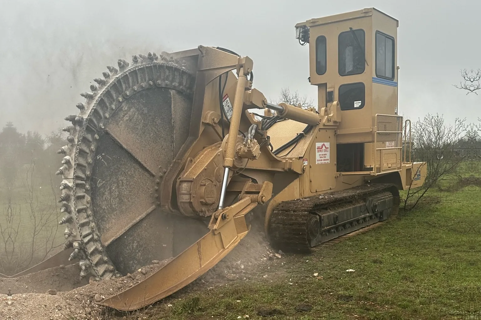 Ridge Rock Excavation rockwheel trencher cutting a rock trench near San Antonio, Texas
